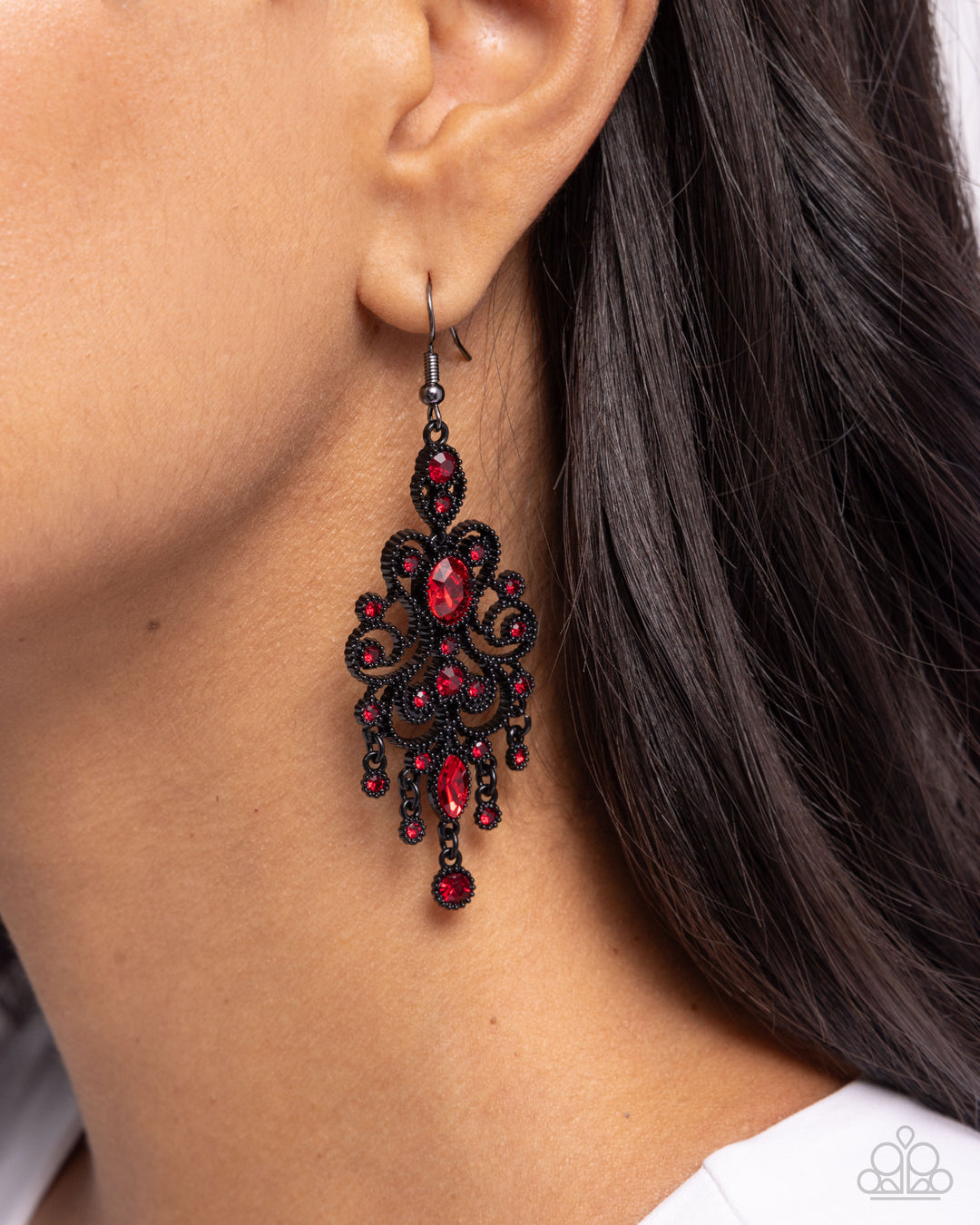 And Red Earrings Black Dress With Red Accessories Woman Wearing A Black  Dress Wearing Red Earrings Sitting On Chair